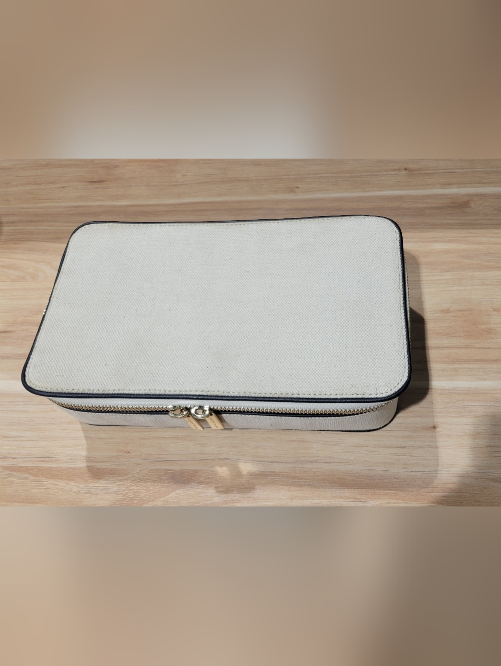 Cream Travel Organizer Case with Black Trim and Gold Zipper